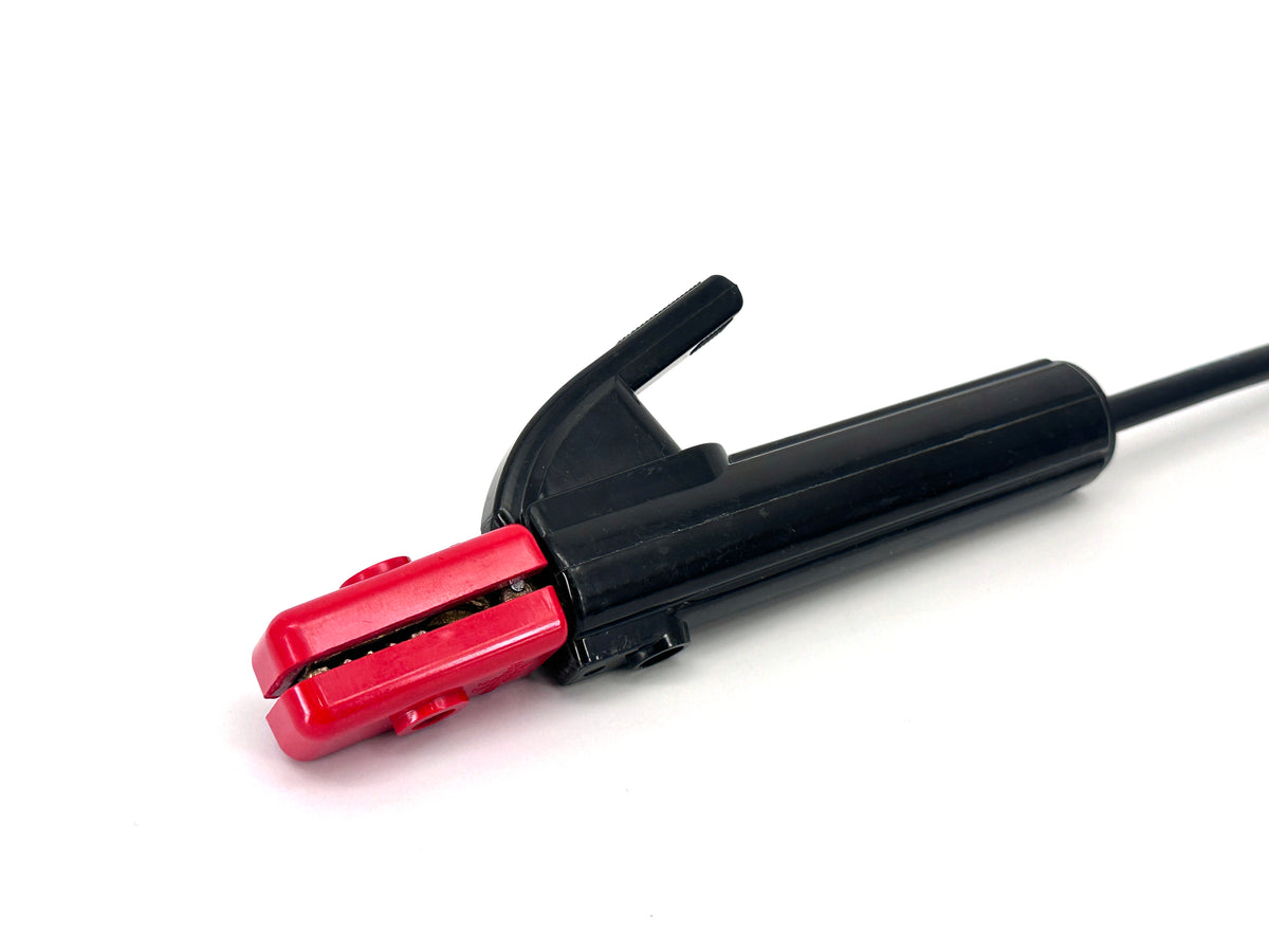 Close-up of red and black electrode clamp with lead wire